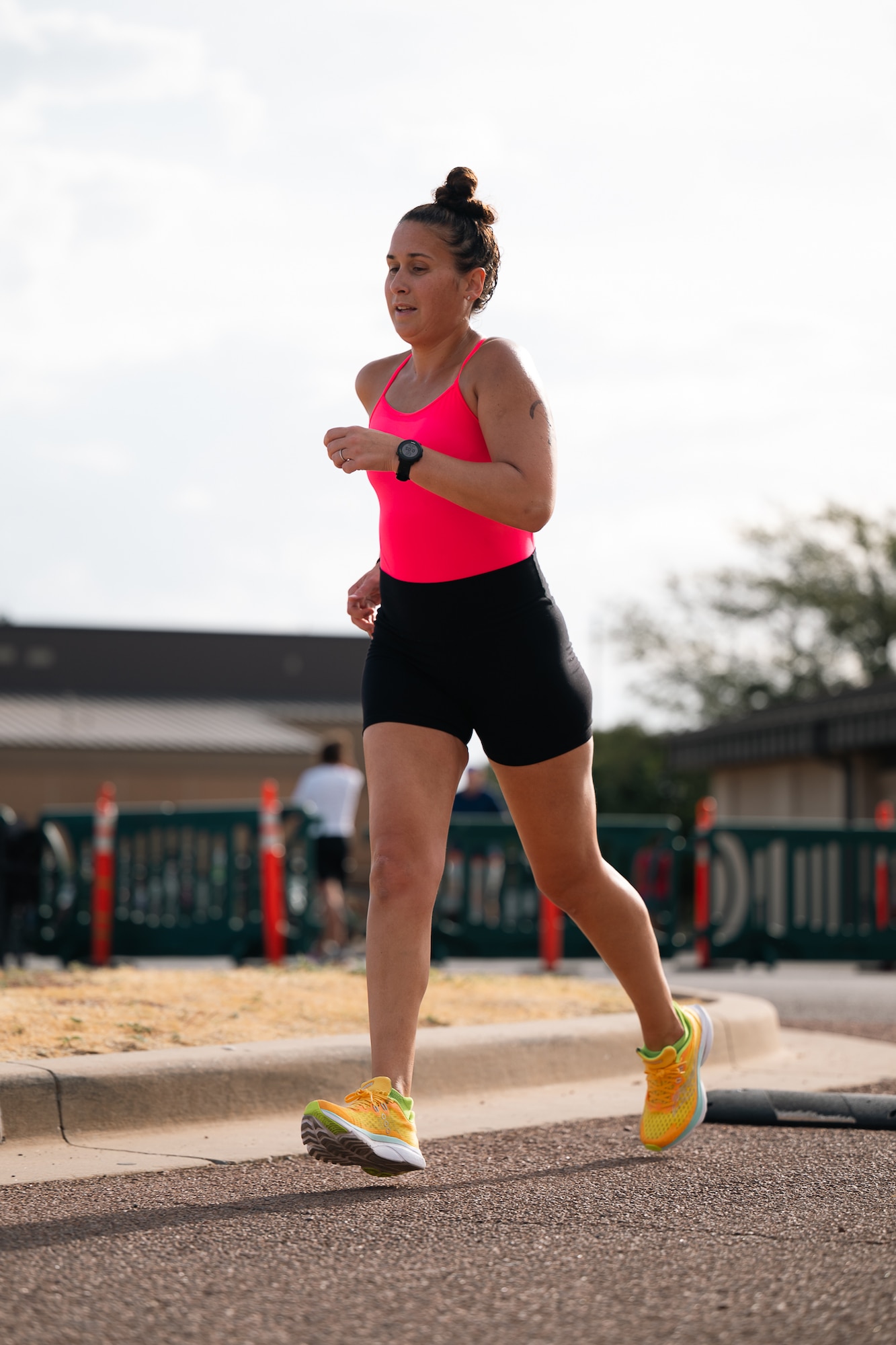 U.S. Air Force Maj. Meara McCarthy runs during a sprint triathlon at Altus Air Force Base, Oklahoma, Aug. 22, 2026. The event reflected the installation’s emphasis on fitness as a component of readiness and quality of life. (U.S. Air Force photo by Senior Airman Jonah Bliss)