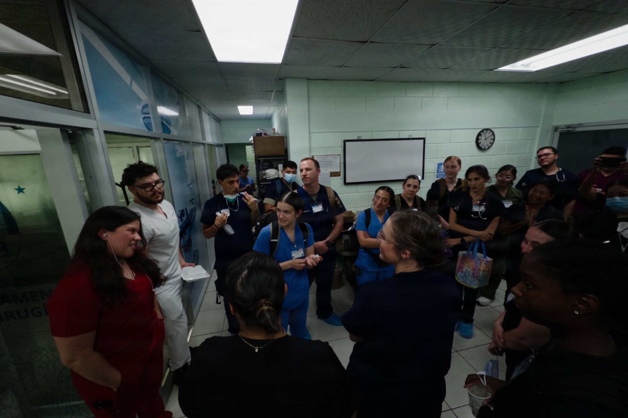 U.S. Airmen assigned to the 944th Aeromedical Staging Squadron and Honduran medical professionals gather during a Medical Readiness Training Exercise in San Pedro Sula, Honduras. The exercise brought together U.S. military and host-nation medical personnel to provide patient care while strengthening teamwork and medical readiness. (Courtesy photo)