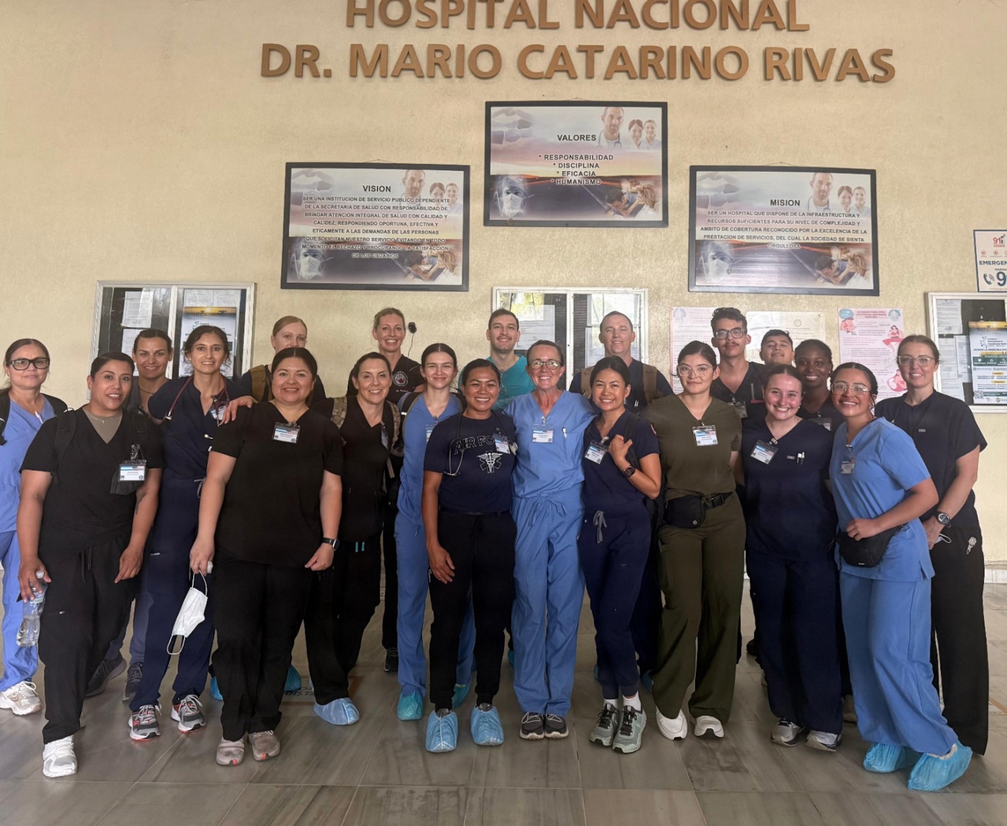 U.S. Airmen assigned to the 944th Aeromedical Staging Squadron and Honduran medical professionals pose for a group photo at Hospital Mario Catarino Rivas during a Medical Readiness Training Exercise in San Pedro Sula, Honduras. The U.S. Southern Command managed exercise provided Airmen hands-on experience working alongside host-nation medical professionals while supporting patient care in local hospitals and community outreach locations. (Courtesy photo)