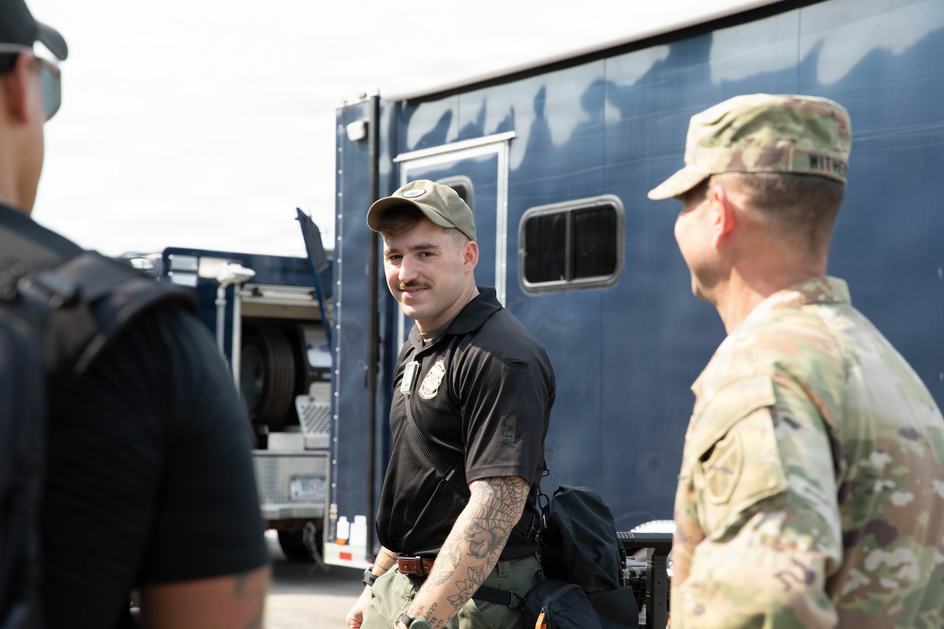 U.S. Army Sgt. Dylan TrueHeart talks with Command Sgt. Maj. Jesse Withers during a training exercise at Jim Beam Distillery Booker Noe Plant in Boston, Kentucky, Aug. 11, 2026.