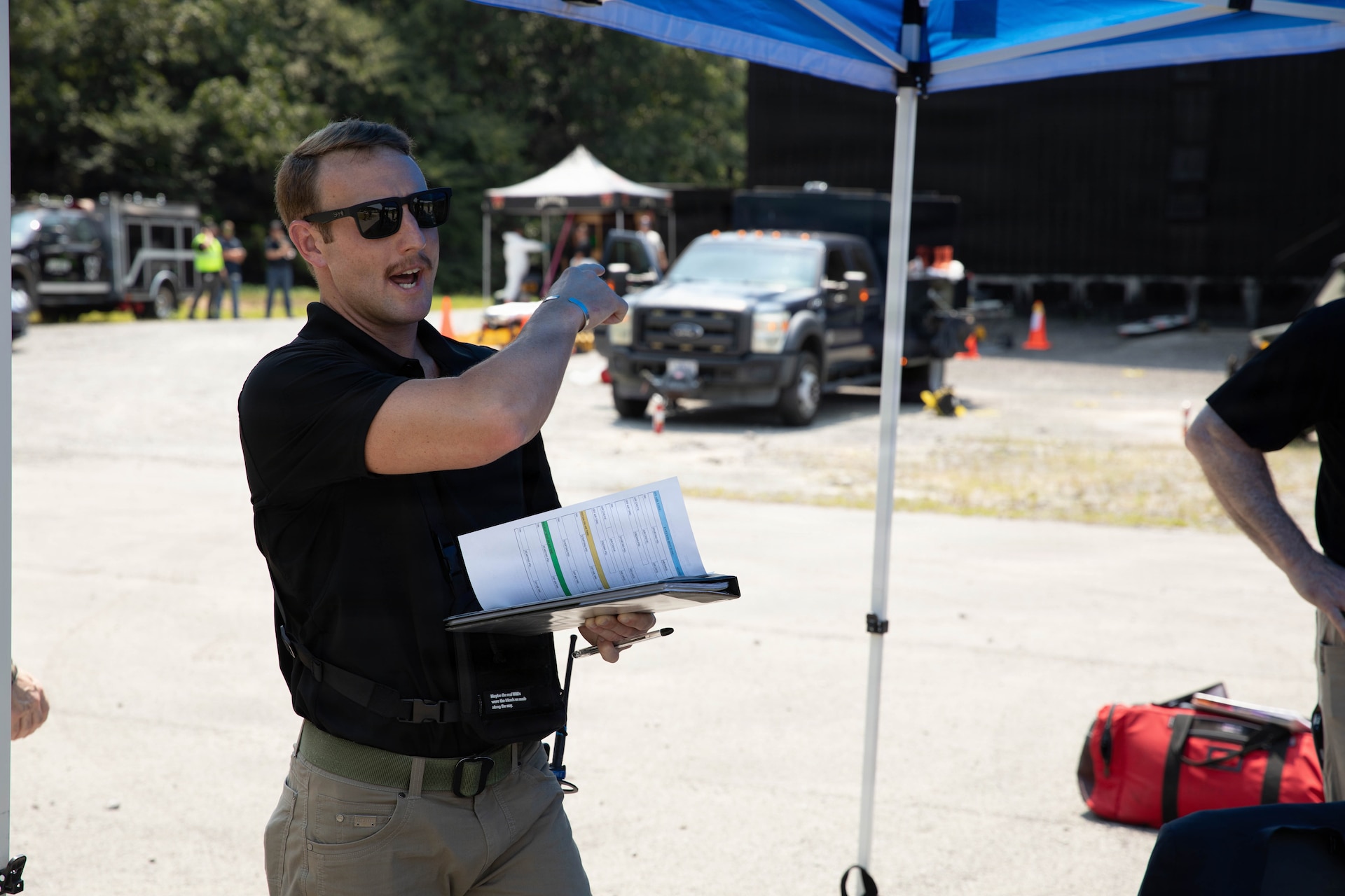 U.S. Army Sgt. 1st Class Landon Smith provides instructions prior to a training scenario at Jim Beam Distillery Booker Noe Plant in Boston, Kentucky, Aug. 11, 2026.