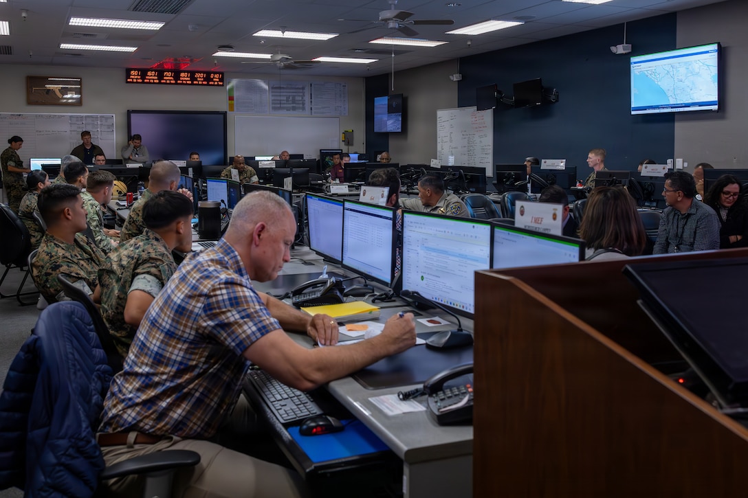U.S. Marines, Sailors and staff with Marine Corps Installations West conduct a tabletop exercise outbrief during Semper Durus 26 at Marine Corps Base Camp Pendleton, Calif., April 22, 2026. Semper Durus is a Marine Corps Installations West full-scale regional command training and interagency exercise designed to enhance emergency preparedness and rapid response capabilities across multiple Marine Corps installations in the southwestern United States. (U.S. Marine Corps photo by Cpl. Noah Martinez)