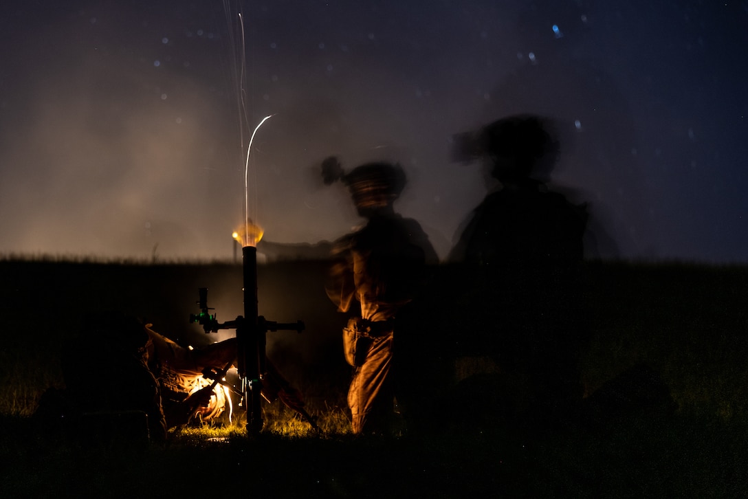 U.S. Marines with 3rd Battalion, 6th Marine Regiment, 2d Marine Division fire an M224 60mm mortar during a platoon attack range on Camp Lejeune, North Carolina, Aug. 21, 2024. This two week-long exercise promoted a comprehensive warfighting ability and trained the next generation of combat ready forces. (U.S. Marine Corps photo by Lance Cpl. Brian Bolin Jr.)