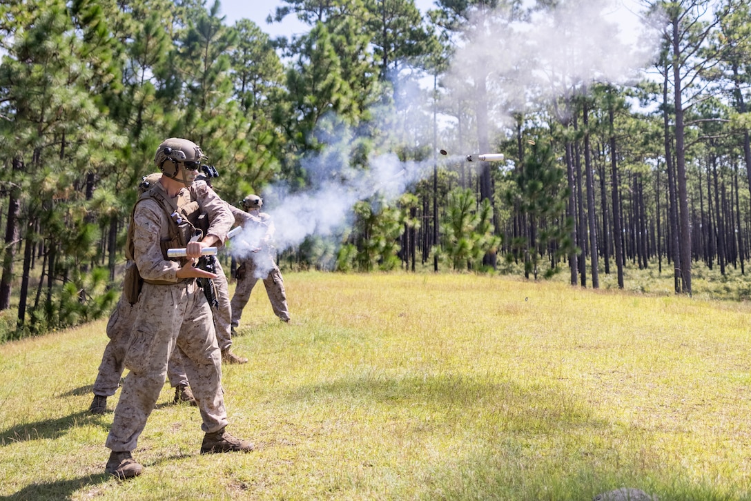 U.S. Marines with 3rd Battalion, 6th Marine Regiment, 2d Marine Division fire signal flares during a platoon attack range on Camp Lejeune, North Carolina, Aug. 21, 2024. This two week-long exercise promoted a comprehensive warfighting ability and trained the next generation of combat ready forces. (U.S. Marine Corps photo by Lance Cpl. Brian Bolin Jr.)