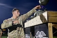 A U.S. Army 2nd Lieutenant throws sandbags during the Combat Field Test (CFT) at the Kentucky National Guard’s pre-command course, held at Wendell H. Ford Regional Training Center in Greenville, Kentucky, Aug. 15, 2026. The CFT was part of a four-day course that prepared new and incoming command teams to take on senior leadership roles in their units. (U.S. Army National Guard photo by Sgt. 1st Class Benjamin Crane)