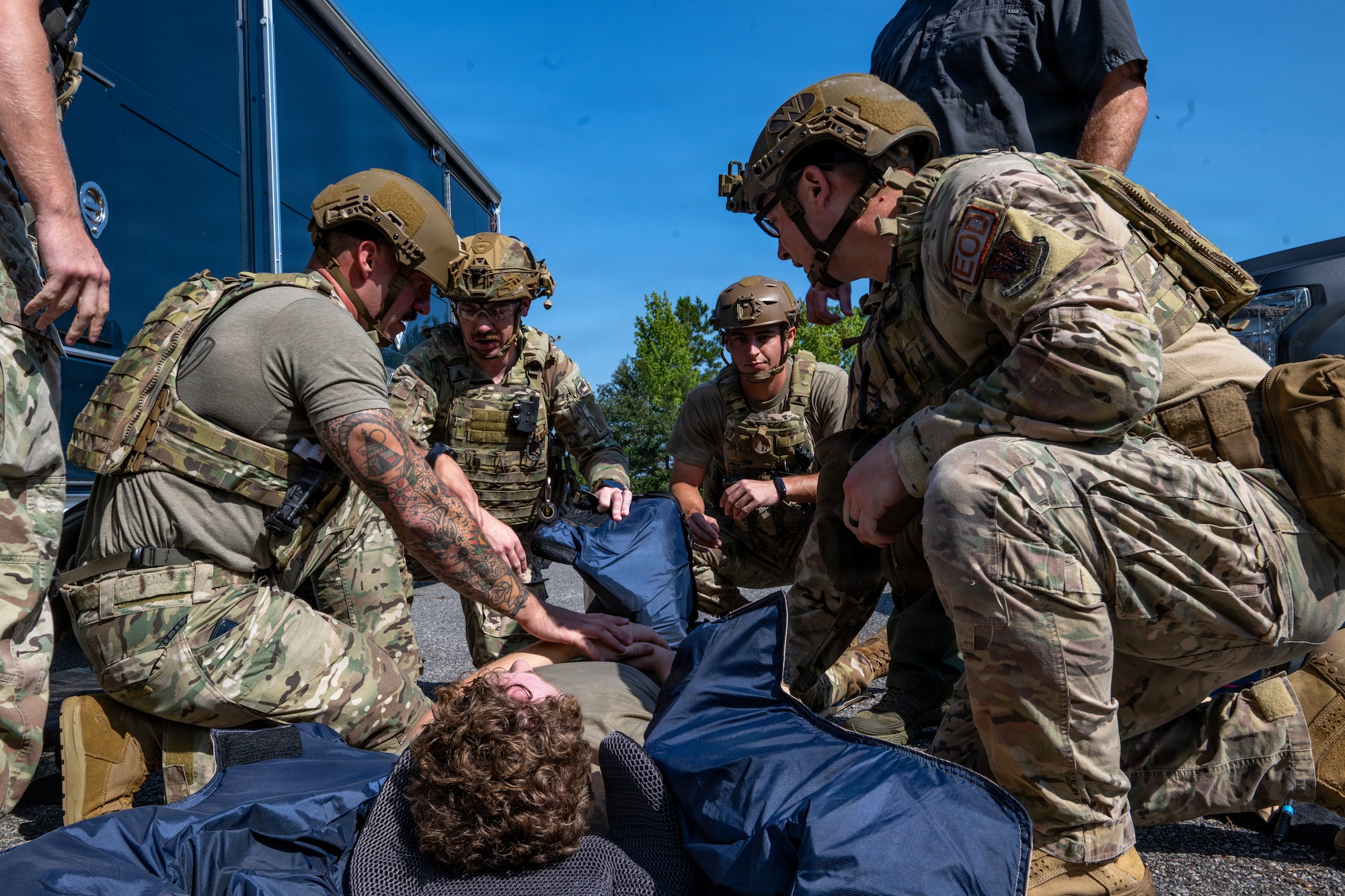 Airman applying TCCC.