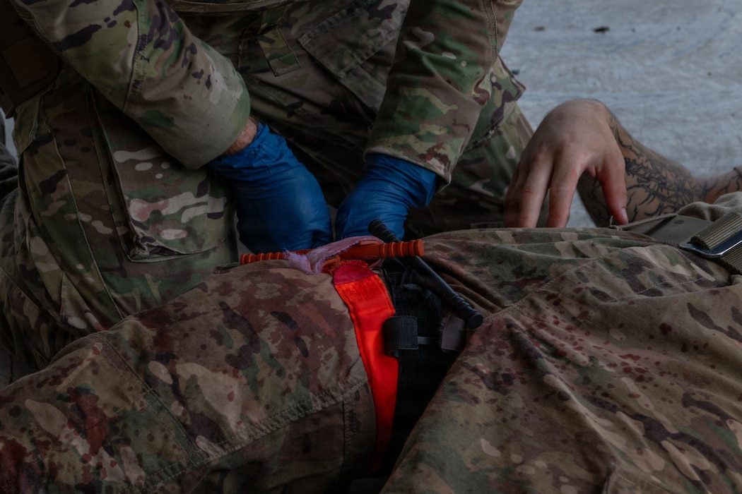 Airman applying TCCC.