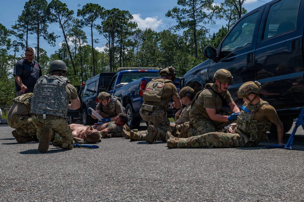 Airman applying TCCC.