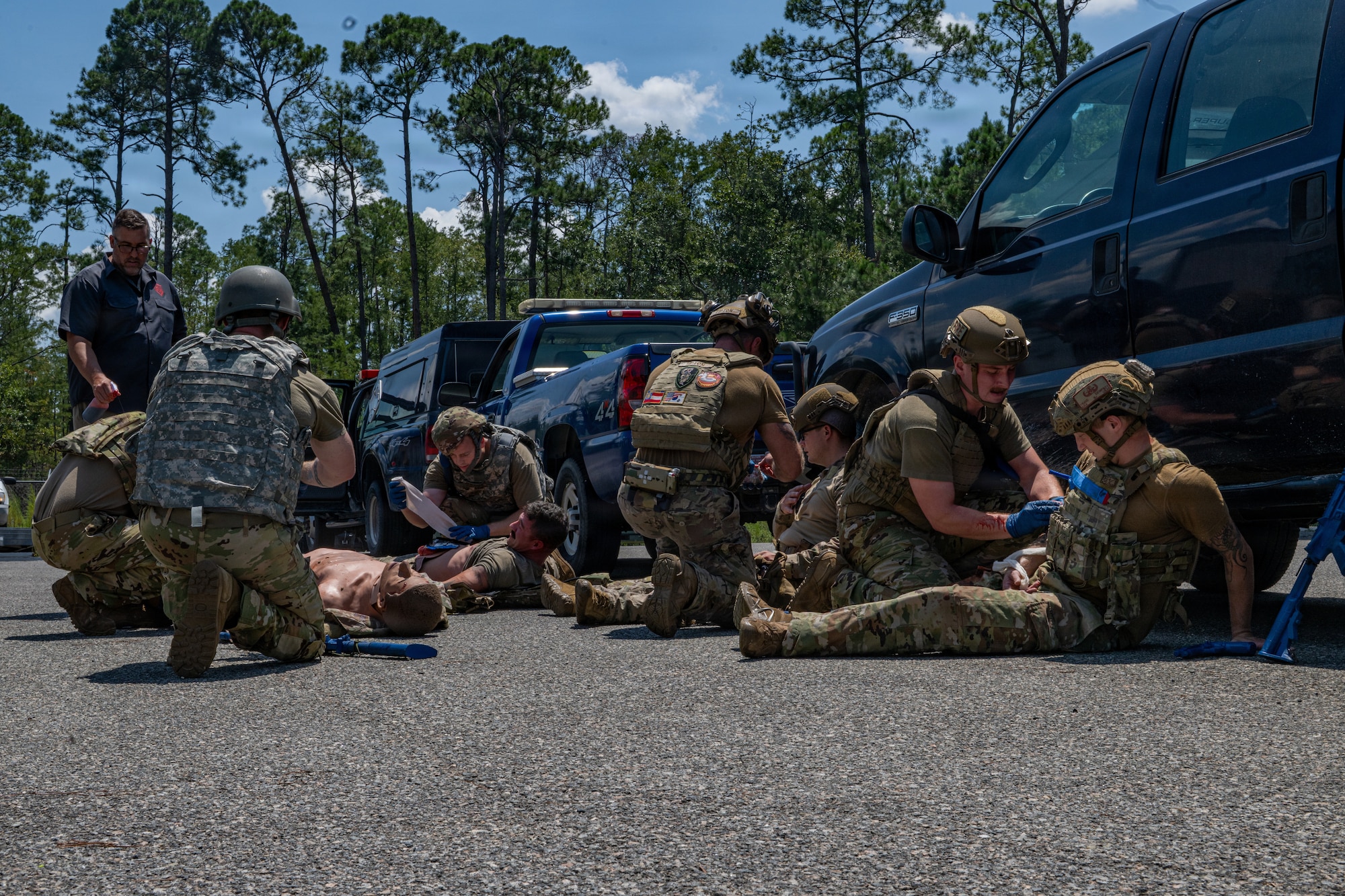 Airman applying TCCC.