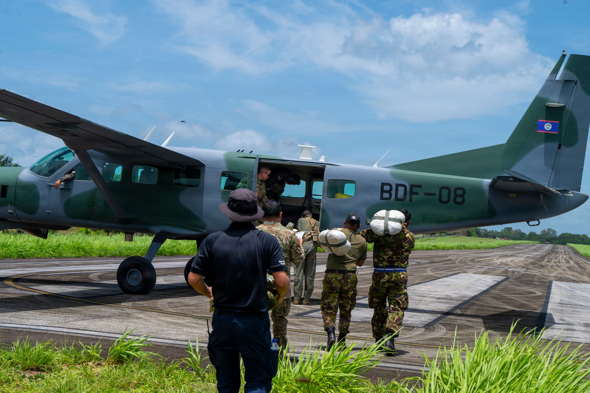 Men reload an aircraft.