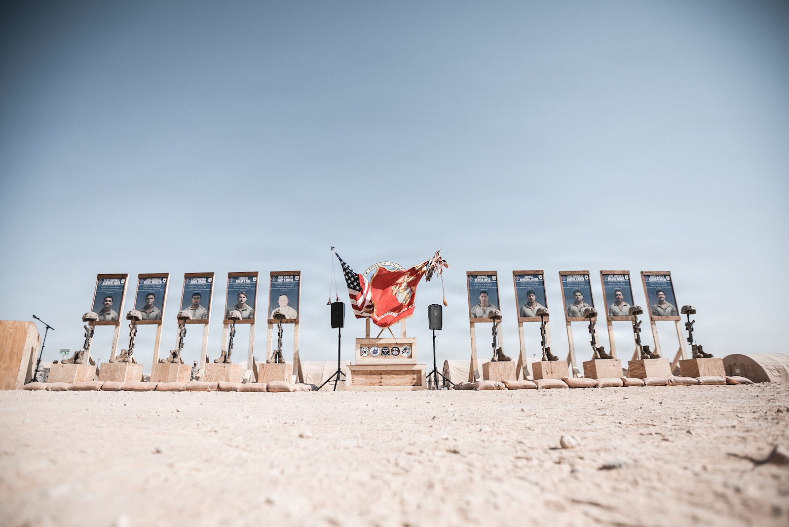 Ten battlefield crosses stand in honor of fallen Marines with 2nd Battalion, 1st Marine Regiment, 1st Marine Division, during a memorial ceremony at Prince Sultan Air Base, Kingdom of Saudi Arabia, Sept. 12, 2021.  The ceremony was held to honor the 10 Marines with 2nd Bn., 1st Marines, who were killed in a suicide attack on Aug. 26, 2021, during the U.S. military withdrawal from Afghanistan.