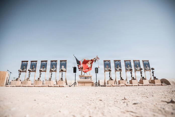 Ten battlefield crosses stand in honor of fallen Marines with 2nd Battalion, 1st Marine Regiment, 1st Marine Division, during a memorial ceremony at Prince Sultan Air Base, Kingdom of Saudi Arabia, Sept. 12, 2021.  The ceremony was held to honor the 10 Marines with 2nd Bn., 1st Marines, who were killed in a suicide attack on Aug. 26, 2021, during the U.S. military withdrawal from Afghanistan.