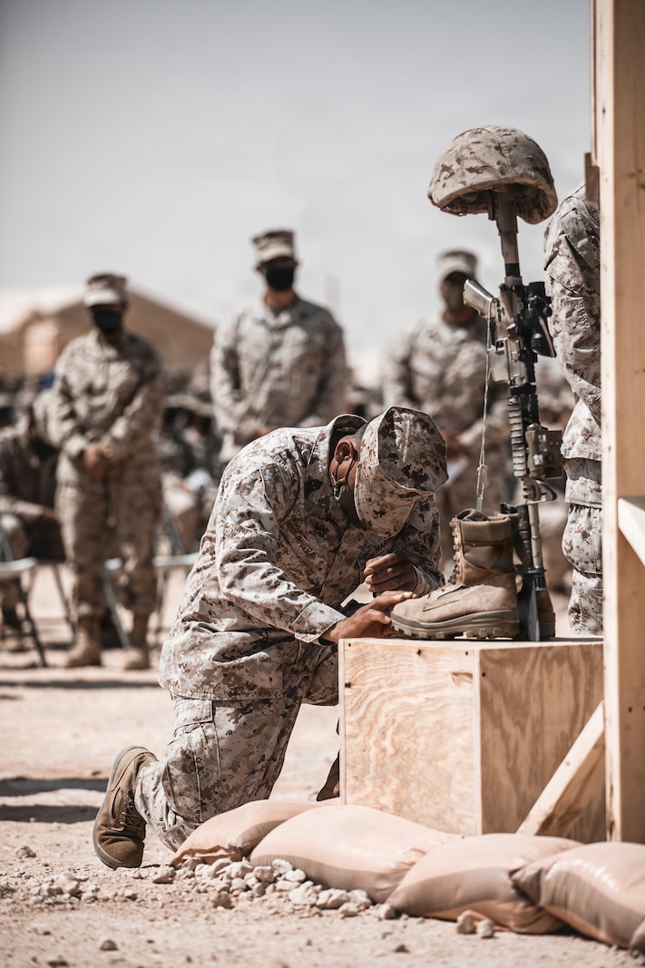 Ten battlefield crosses stand in honor of fallen Marines with 2nd Battalion, 1st Marine Regiment, 1st Marine Division, during a memorial ceremony at Prince Sultan Air Base, Kingdom of Saudi Arabia, Sept. 12, 2021.  The ceremony was held to honor the 10 Marines with 2nd Bn., 1st Marines, who were killed in a suicide attack on Aug. 26, 2021, during the U.S. military withdrawal from Afghanistan.
