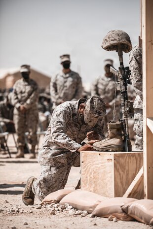 Ten battlefield crosses stand in honor of fallen Marines with 2nd Battalion, 1st Marine Regiment, 1st Marine Division, during a memorial ceremony at Prince Sultan Air Base, Kingdom of Saudi Arabia, Sept. 12, 2021.  The ceremony was held to honor the 10 Marines with 2nd Bn., 1st Marines, who were killed in a suicide attack on Aug. 26, 2021, during the U.S. military withdrawal from Afghanistan.