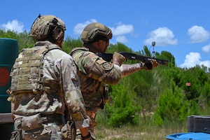 An Airman assigned to the 31st Air Task Force fires a drone-defeating shotgun during counter-small unmanned aerial system defense training near Hurlburt Field, Florida, Aug. 7, 2026. The training enhanced the unit's ability to rapidly detect, track, and filter aerial objects in real time, ensuring early warning of potential airborne threats. (U.S. Air Force photo by Staff Sgt. Ty Pilgrim)