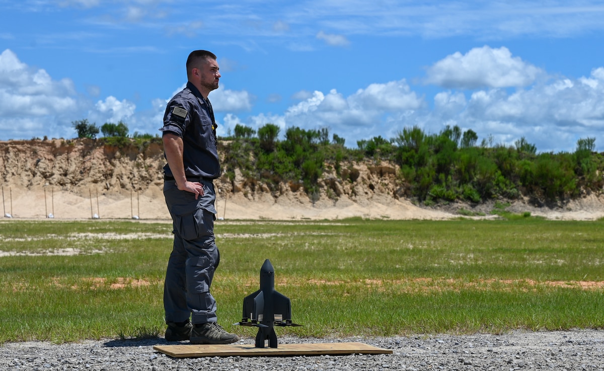 A contractor prepares to fly a first-person view drone during a capabilities demonstration with senior leaders from Air Force Special Operations Command and the 1st Special Operations Wing near Hurlburt Field, Florida, Aug. 7, 2026. The 31st Air Task Force brought together industry experts for a day of conversation and demonstrations related to drone warfare, precision munitions, and unmanned threat detection and mitigation. (U.S. Air Force photo by 2nd Lt. Daniel White)