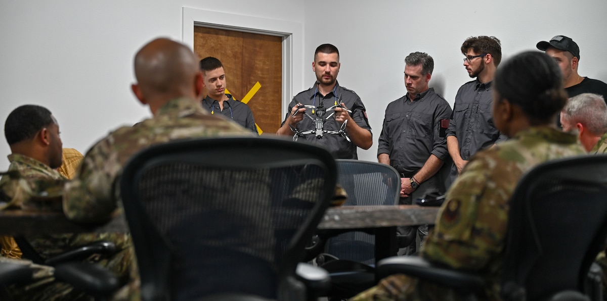 Senior leaders from the 31st Air Task Force, the 1st Special Operations Wing, and Air Force Special Operations Command receive a briefing on emerging drone capabilities near Hurlburt Field, Florida, Aug. 7, 2026. The 31st ATF brought together industry experts for a day of conversation and demonstrations related to drone warfare, precision munitions, and unmanned threat detection and mitigation. (U.S. Air Force photo by 2nd Lt. Daniel White)