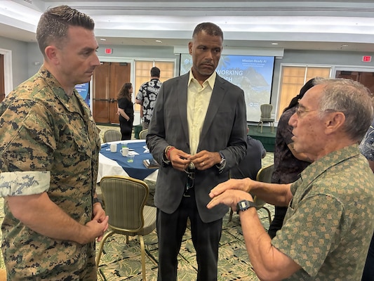 Marine Corps Maj. Steven Norris, left, rotary wing and tiltrotor officer with Marine Corps Forces Pacific; Dr. Andre Stridiron, U.S. Pacific Command J7 Pacific Multi-Domain Training and Experimentation Capability program manager; and Jeff Bloom, right, Armed Forces Communications and Electronics Association (AFCEA) Hawaii vice president of corporate affairs, discuss industry’s role in supporting mission-ready artificial intelligence at the AFCEA Hawaii Tech Talk at Joint Base Pearl Harbor-Hickam, Hawaii, Aug. 4, 2026.