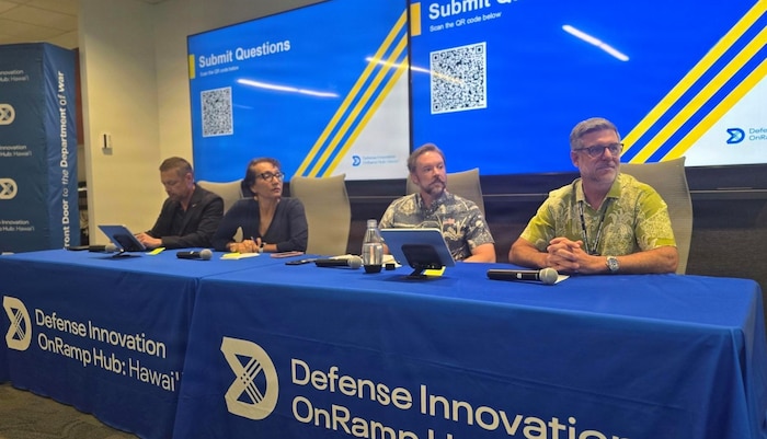 From left, Matt Martin, CAE USA industry partner; Tai Prohaska, U.S. Pacific Command (US PACOM) J7 Pacific Multi-Domain Training and Experimentation Capability (PMTEC) information operations integrator; Andrew Emslie, PMTEC space integrator; and Jamie Giambrone, U.S. Army Pacific deputy director of training, discuss PMTEC initiatives and commercial partnerships during the PMTEC Quarterly Commercial Industry Update in Honolulu, Aug. 6, 2026.