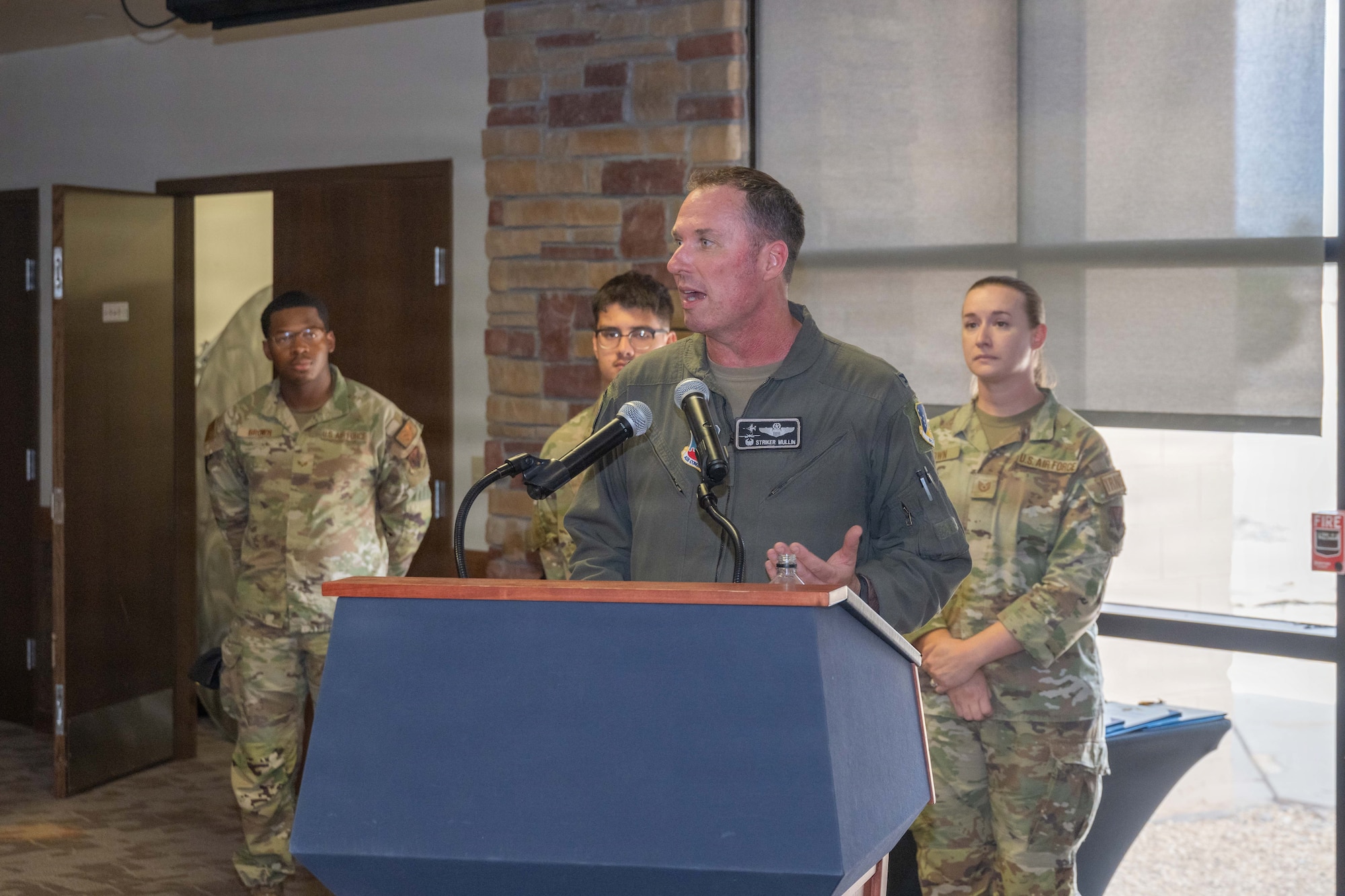 U.S. Air Force Col. Michael Mullin, 49th Wing commander, provides opening remarks during the 49th Wing Security Forces Decoration Ceremony at Holloman Air Force Base, New Mexico, July 10, 2026. The ceremony recognized security forces members for their bravery and heroism while serving in deployed environments. (U.S. Air Force photo by Airman 1st Class Elijah Strickland)