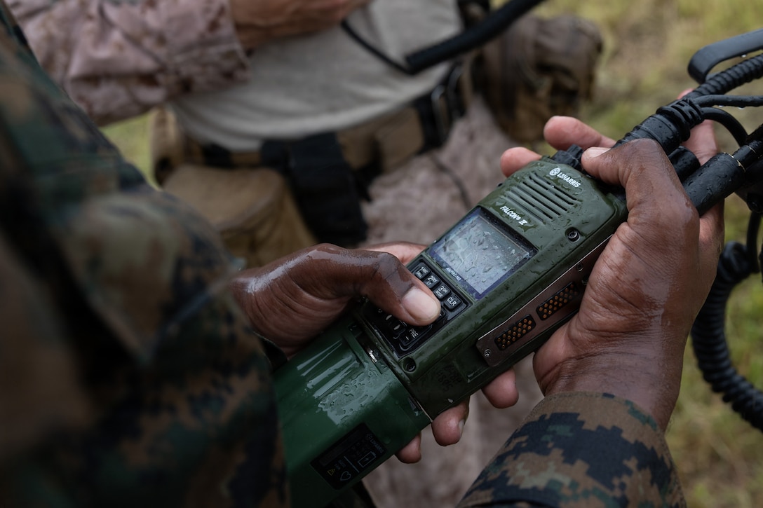 U.S. Marine Corps Cpl. Richard Wilson II, a transmissions systems operator with 12th Littoral Combat Team, 12th Marine Littoral Regiment, 3rd Marine Division programs half-quick for joint terminal attack controller operations during routine training at le-Shima, Okinawa, Japan,  Aug. 20, 2026.