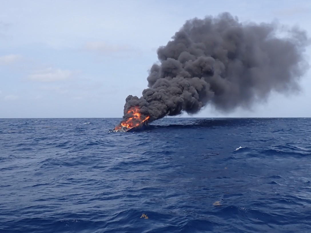 Suspected drug smuggling vessel on fire.