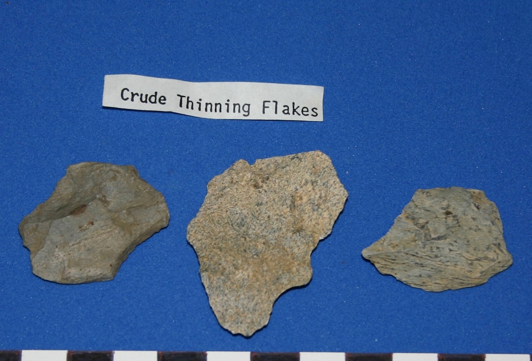 stone flakes on blue background