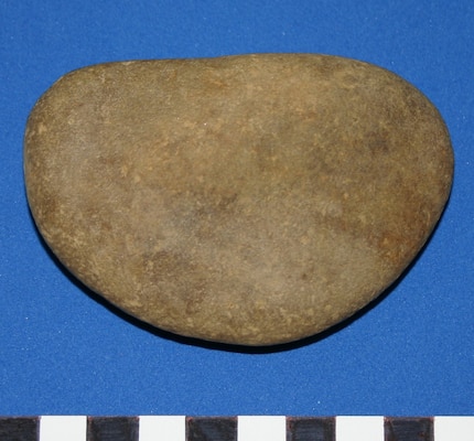 stone on blue background