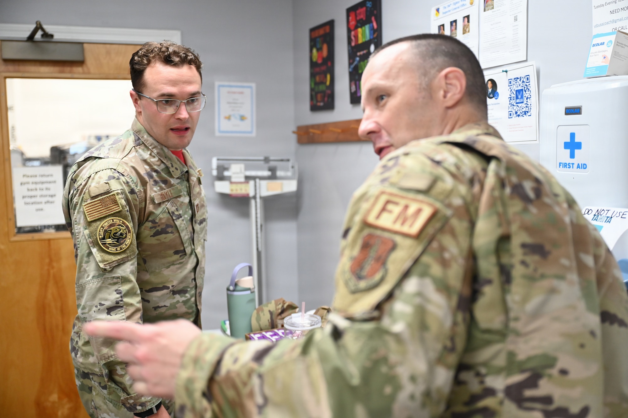Capt. Mark Boyle, a 104th Fighter Wing comptroller, checks in with Master Sgt. Jeremy Knowles, a 104th Fighter Wing finance noncommissioned officer, for the body composition program at Barnes Air National Guard Base, Westfield, Mass., Aug. 21, 2026.
