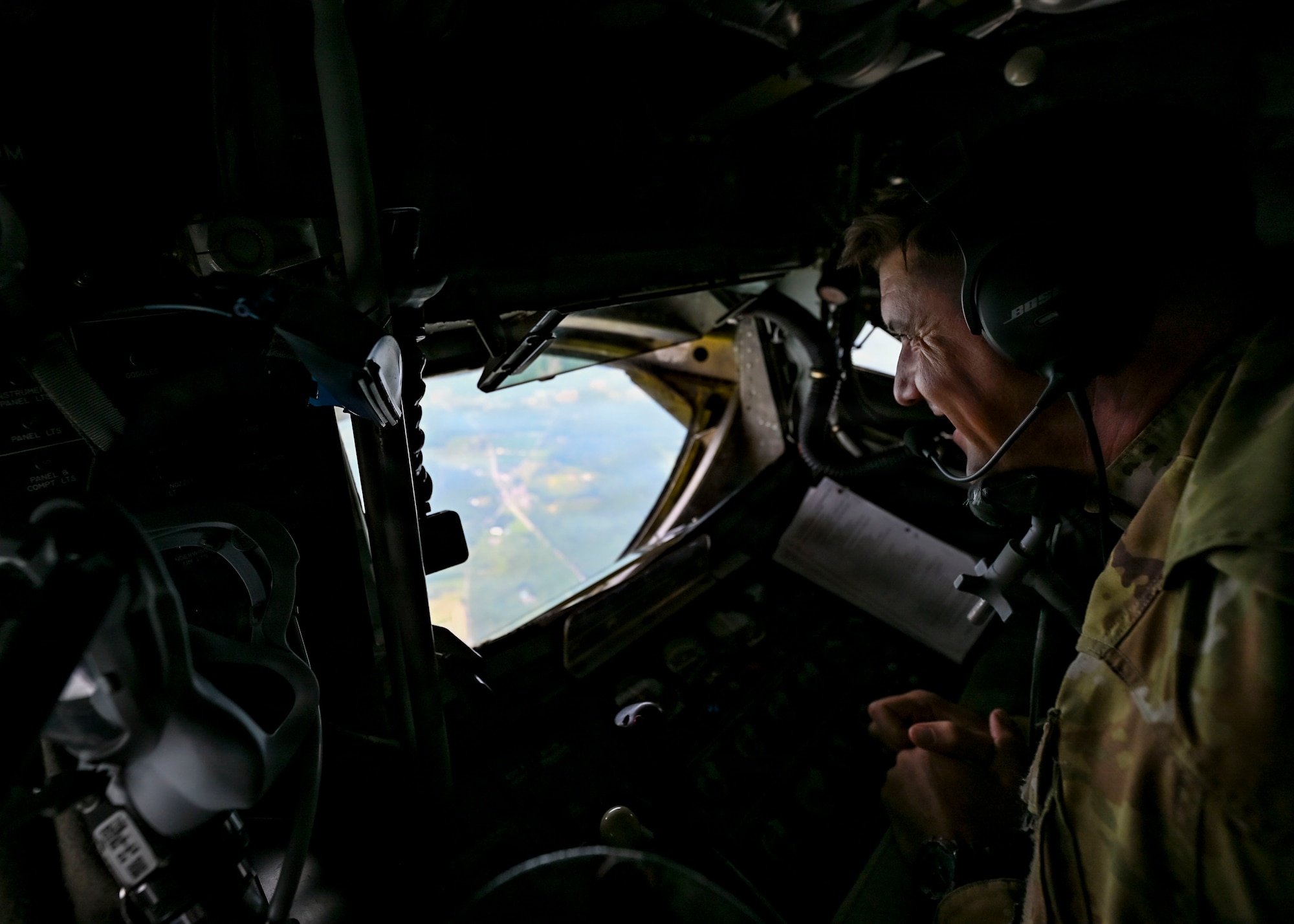 U.S. Air Force Master Sgt. Nathaniel Scheffel, 91st Air Refueling Squadron boom operator,  prepares to lower the boom during a flyover above Arlington National Cemetery, Virginia, Aug. 20, 2026. The flyover honored the life and service of retired U.S. Air Force Col. Jesse C. Bush Jr., a World War II veteran and last living survivor of the Berlin Airlift. (U.S. Air Force photo by Senior Airman Monique Stober)