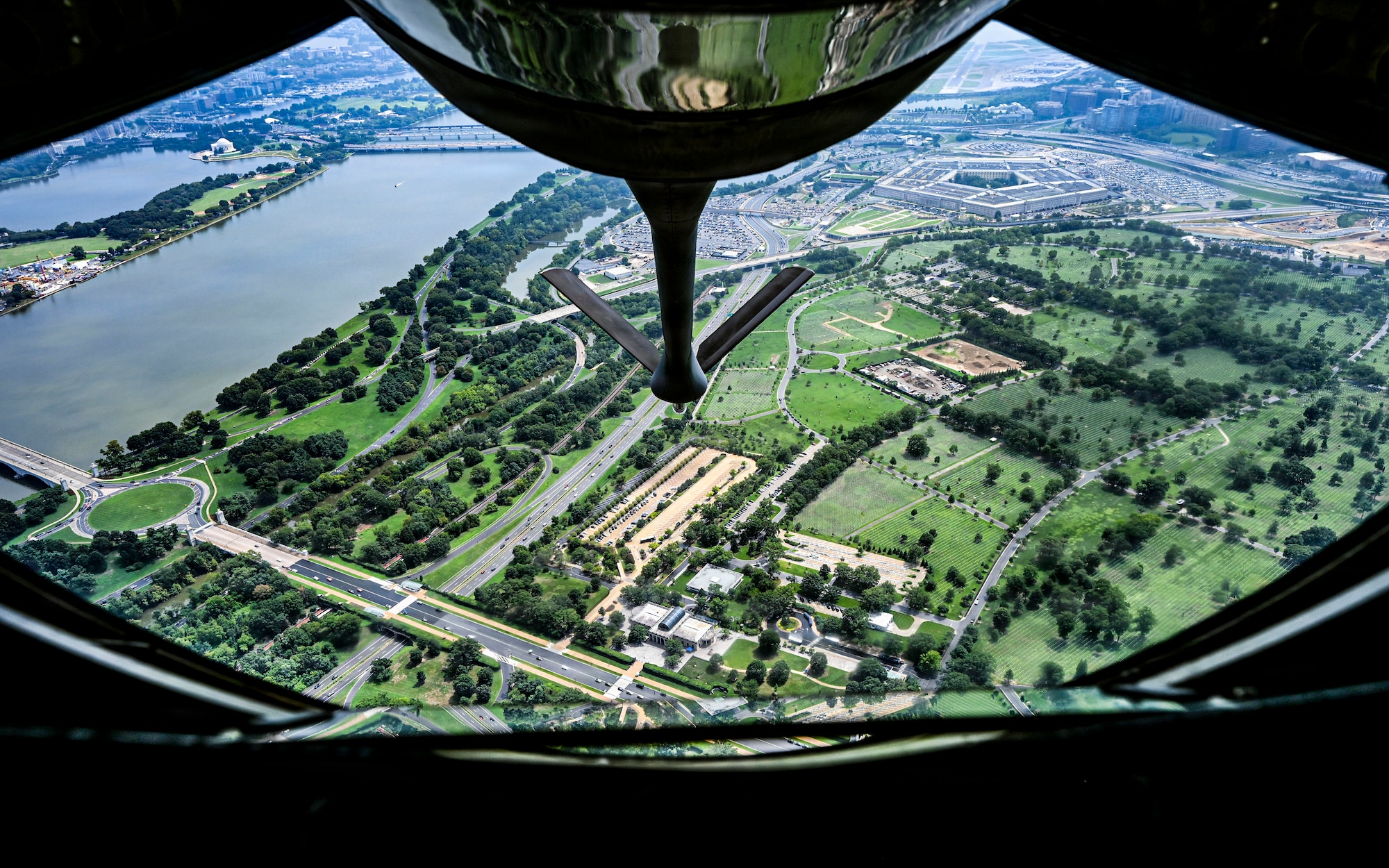 Aircrew assigned to the 91st Air Refueling Squadron honor retired U.S. Air Force Col. Jesse C. Bush Jr. with a flyover above Arlington National Cemetery during his interment ceremony in Arlington, Virginia, Aug. 20, 2026. Bush, a World War II veteran and the last living survivor of the Berlin Airlift, served in the U.S. Air Force for more than 31 years. The flyover honored his life, service and lasting legacy. (U.S. Air Force photo by Senior Airman Monique Stober)
