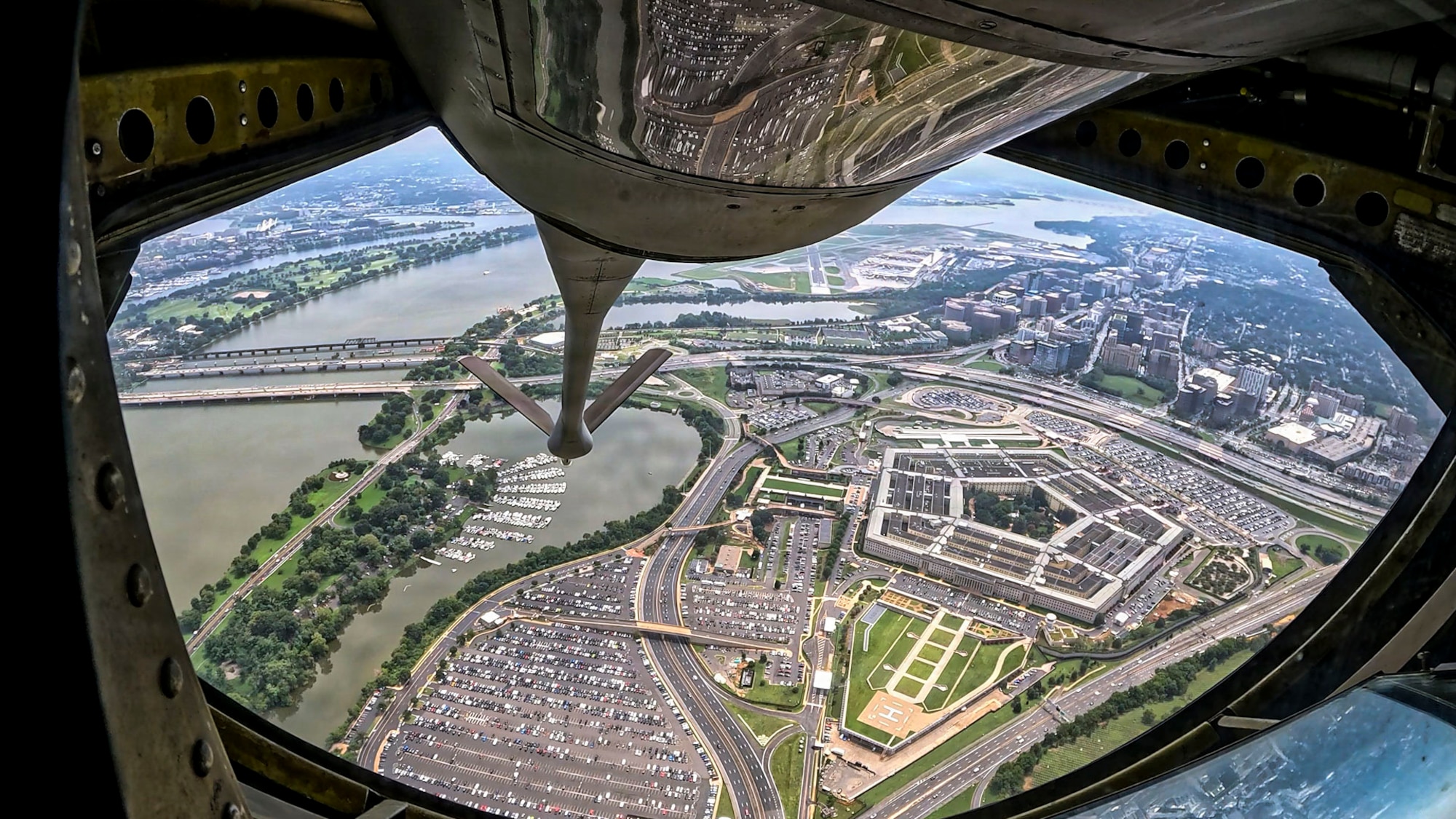 A KC-135 Stratotanker assigned to the 6th Air Refueling Wing flies over the Pentagon during a flyover above Arlington National Cemetery, Arlington, Virginia Aug. 20, 2026. The Pentagon serves as the headquarters of the U.S. Department of Defense and is one of the world’s largest office buildings. (U.S. Air Force photo by Senior Airman Monique Stober)