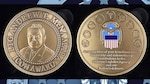 two sides of a golden coin is shown,
