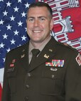 LTC Kenneth M. Porter official photo with American and USACE flags as the background