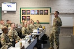 U.S. Army Senior Enlisted Advisor John T. Raines III, senior enlisted advisor to the chief, National Guard Bureau, speaks to officers and senior noncommissioned officers during Kentucky's pre-command course at Wendell H. Ford Regional Training Center in Greenville, Kentucky, Aug. 15, 2026. While visiting, Raines also took part in the Combat Field Test alongside course participants. Photo by Sgt. 1st Class Benjamin Crane.
