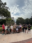 Service members from USMEPCOM 8th Battalion pose for a photo in New Orleans during the 8th Battalion Junior Enlistment Event. This three-day event was designed for the E-6 and below attending to build connections, develop their leadership skills and motivate them to see their own potential.