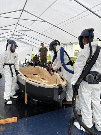 Marines Learn Foam Raiding Craft Manufacturing