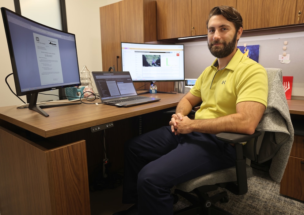 Man sitting at his desk.