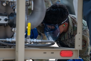U.S. Air Force Senior Airman Dominick Pallo, 92nd Logistics Readiness Squadron fuels distribution operator, inspects refueling equipment during the Combat Readiness Exercise at Fairchild Air Force Base, Washington, Aug. 7, 2026.