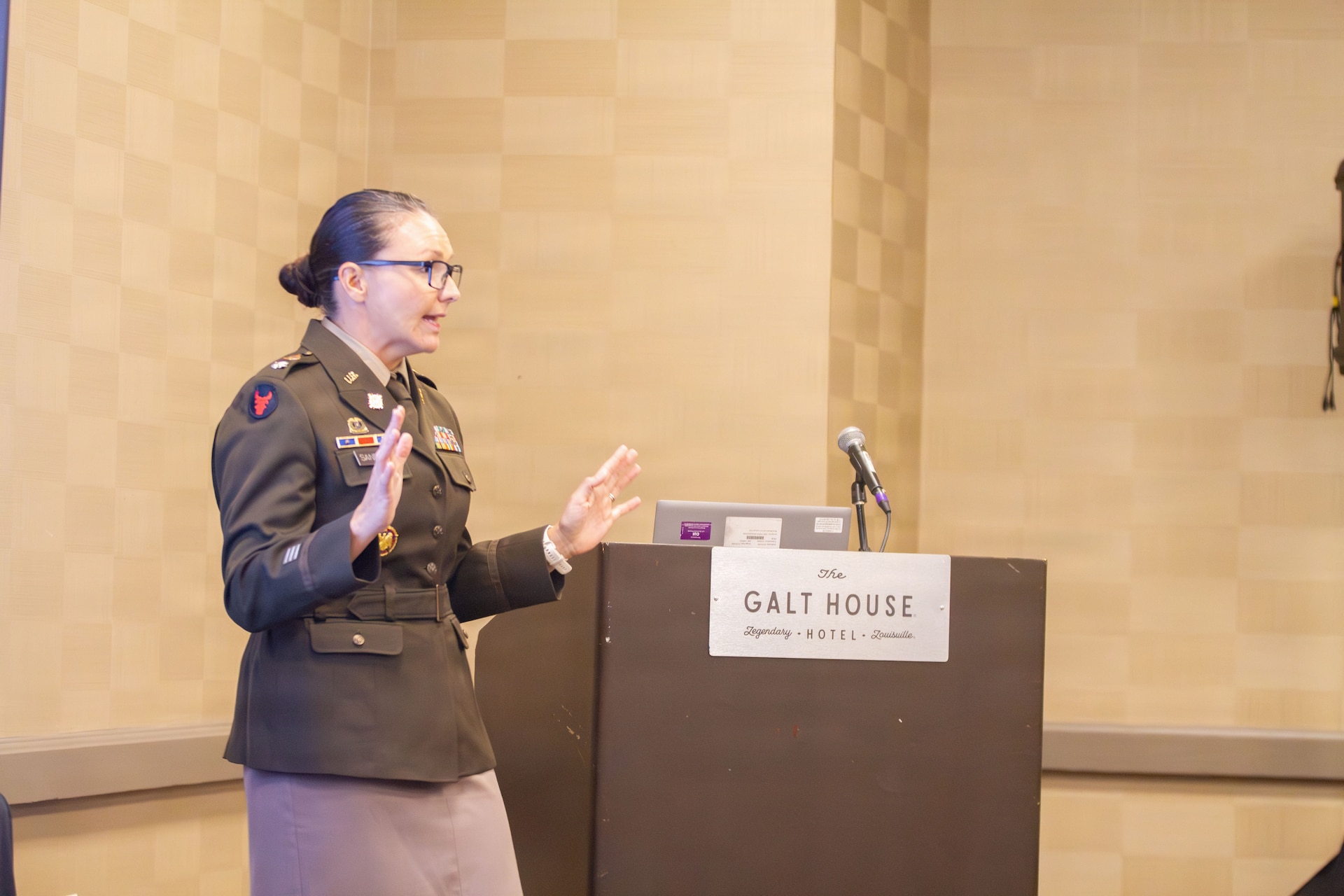 U.S. Army Lt. Col. Dayna Sanders speaks to local leaders at the 2026 Governor's Local Issues Conference in Louisville, Kentucky, Aug. 20.