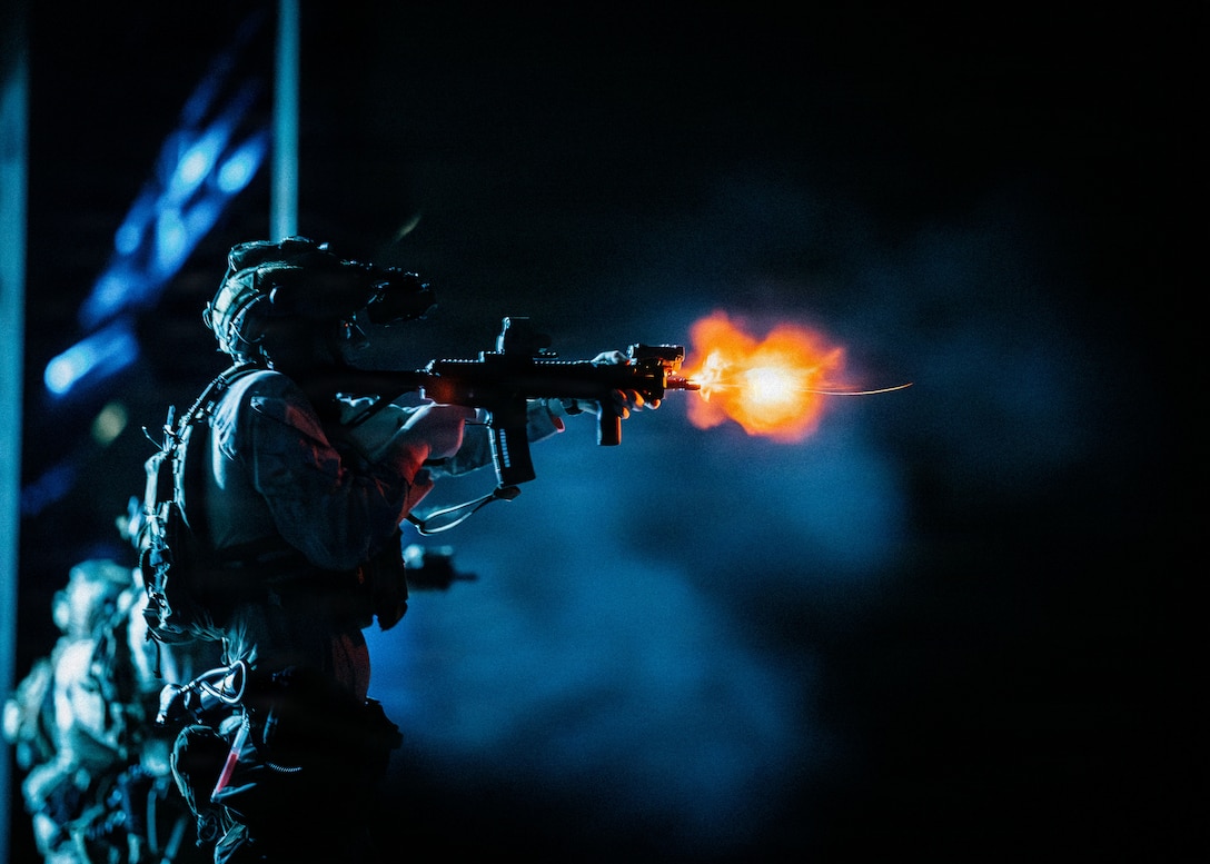 A U.S. Marine with the Maritime Raid Force, 11th Marine Expeditionary Unit, fires an M27 infantry automatic rifle during a live-fire range aboard Wasp-class amphibious assault ship USS Boxer (LHD 4) in the U.S. Central Command area of responsibility, Aug. 9, 2026. (U.S. Marine Corps photo by Sgt. Joseph Helms)