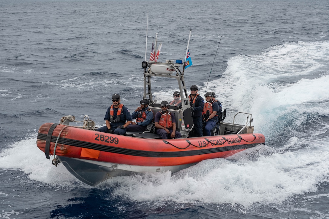 A 26-foot Over the Horizon Small Boat crew assigned to Coast Guard Cutter Harriet Lane (WMEC 903), and Fijian partners transit to the Harriet Lane after completing a bilateral law enforcement boarding in Fiji, June 24, 2026. These boardings boost maritime domain awareness and enhance the ability to deter illicit activity within Fijian waters. (U.S. Coast Guard photo, courtesy CGC Harriet Lane)