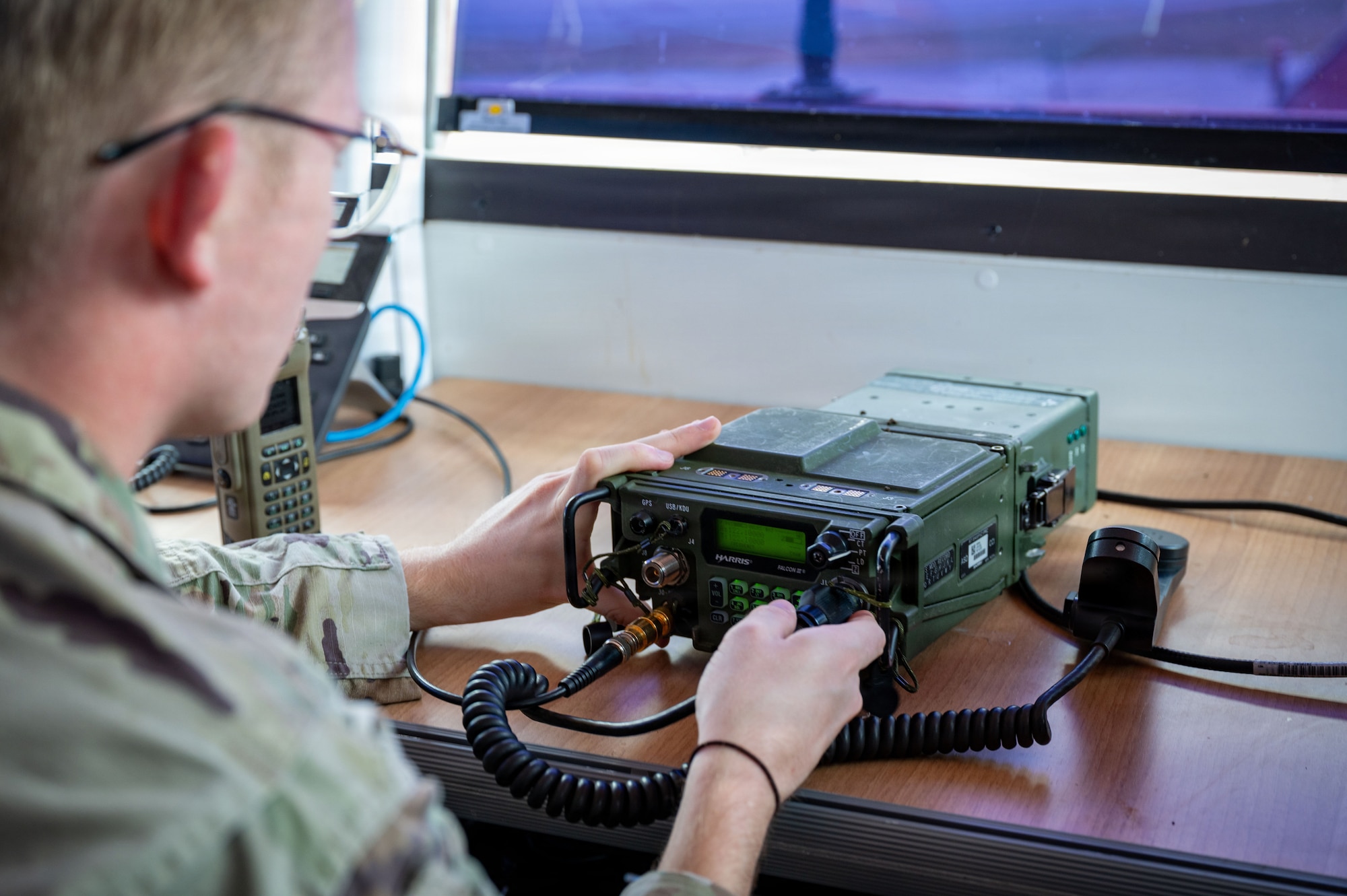 A man uses a radio