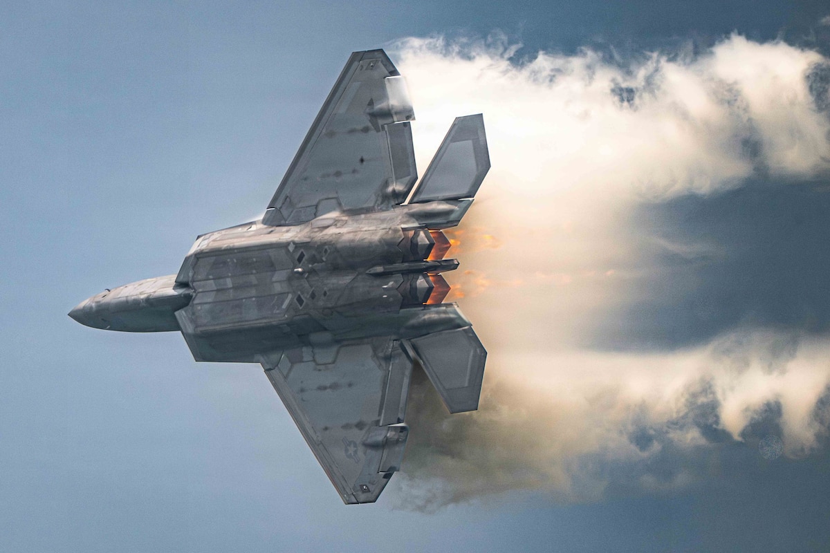 Capt. Nick Le Tourneau, F-22 Raptor Demonstration Team commander and pilot, performs an aerial demonstration during the Chicago Air and Water Show in Chicago, Ill., Aug. 14, 2026. Condensation forms around the aircraft due to rapid changes in air pressure and humidity during high-speed maneuvers. (U.S. Air Force photo by Staff Sgt. Mary Bowers)