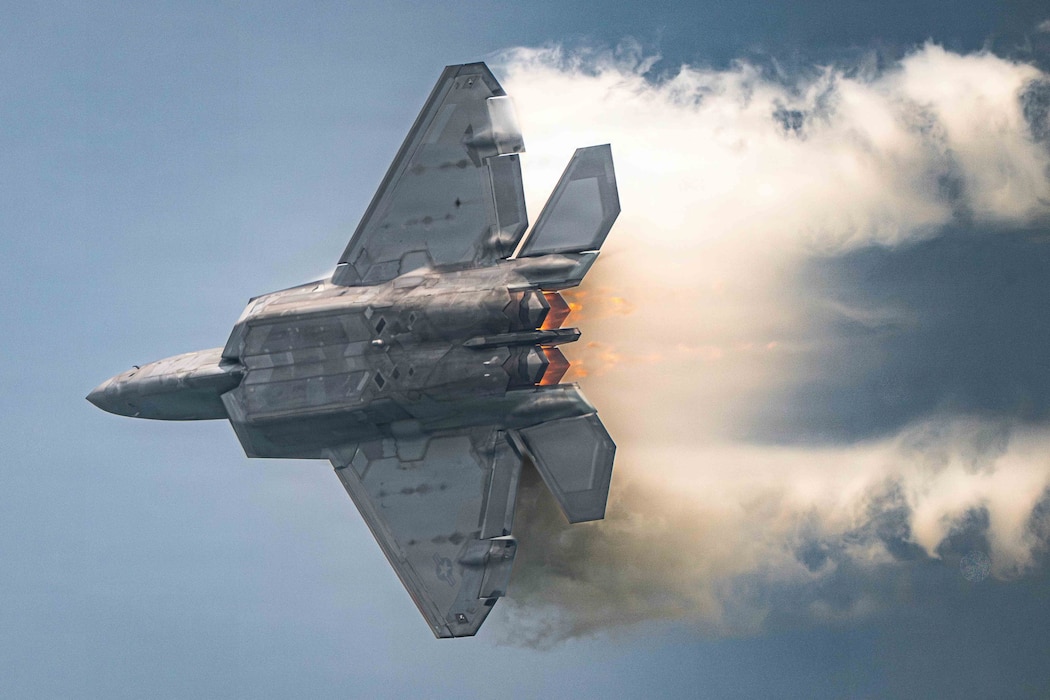 Capt. Nick Le Tourneau, F-22 Raptor Demonstration Team commander and pilot, performs an aerial demonstration during the Chicago Air and Water Show in Chicago, Ill., Aug. 14, 2026. Condensation forms around the aircraft due to rapid changes in air pressure and humidity during high-speed maneuvers. (U.S. Air Force photo by Staff Sgt. Mary Bowers)