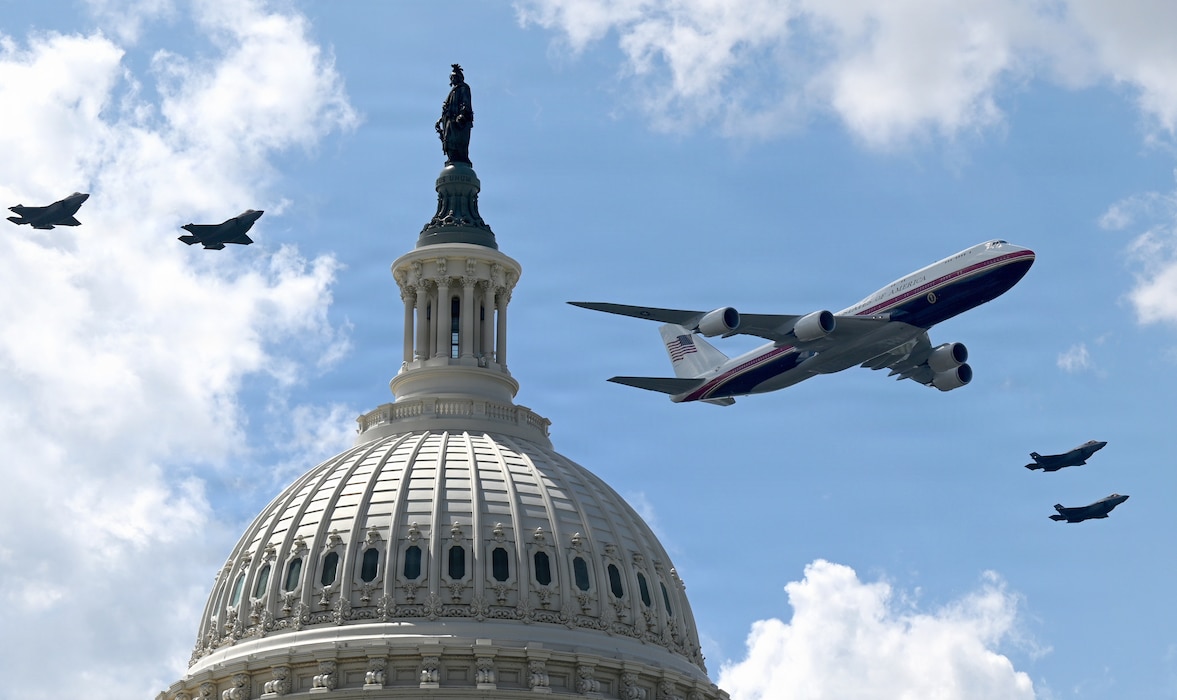 Air Force One, flanked by F-35A Lightning II aircraft, performs a flyover near the U.S. Capitol in Washington, Aug. 23, 2026. The flyover was part of the Freedom 250 Grand Prix held along a portion of the National Mall. (U.S. Airforce photo by Andy Morataya)