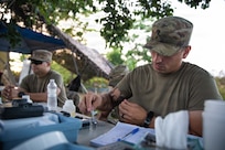 U.S. Army Spc. Jesús D. Ramos, a water treatment specialist assigned to the 105th Quartermaster Water Purification and Distribution Company, 191st Regional Support Group, Puerto Rico Army National Guard, conducts water-quality testing at a water purification site in Canóvanas, Puerto Rico, Aug. 20, 2026.