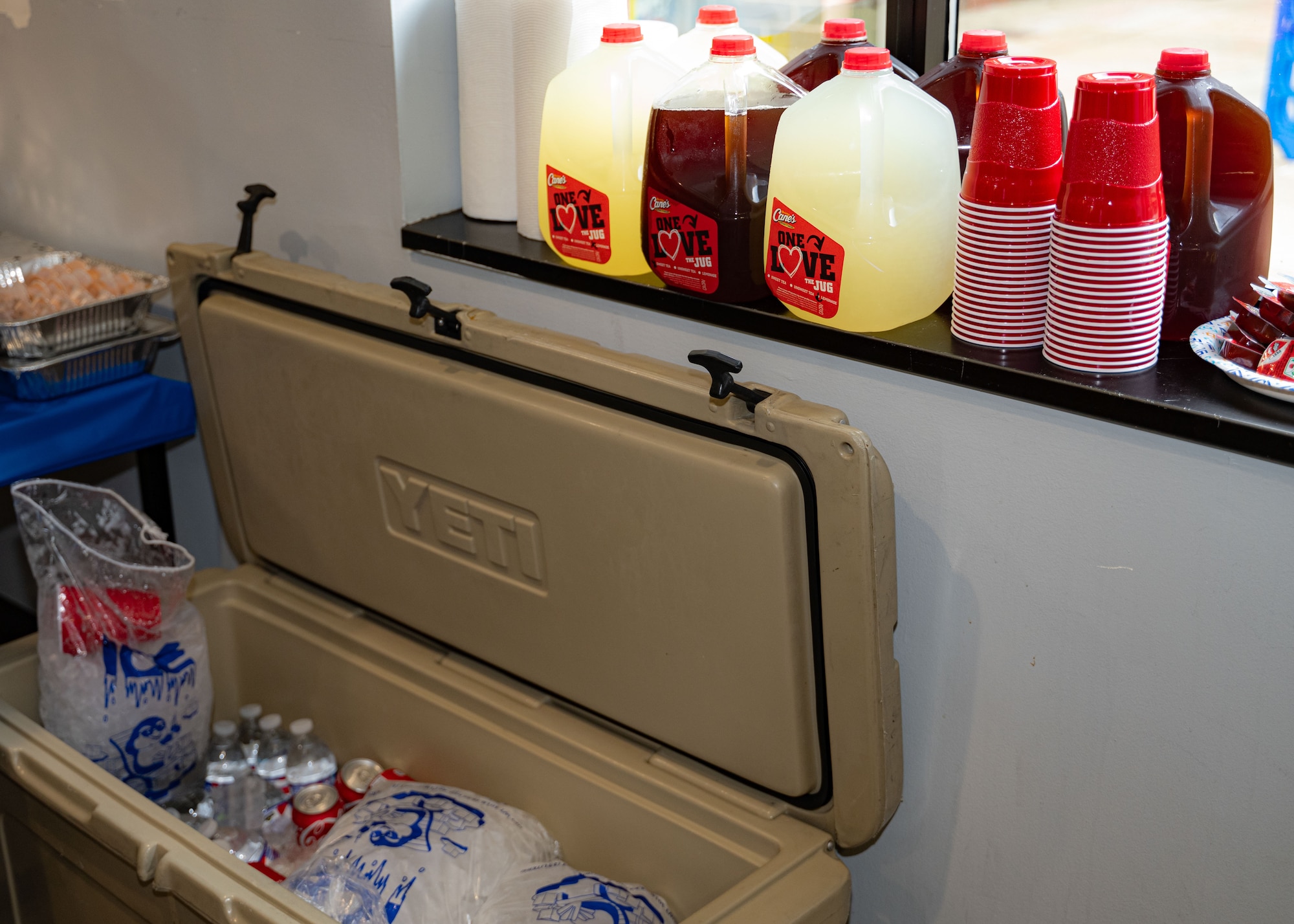 U.S. Air Force First Sgts. from Operation Warmheart host a dorm dinner drinks and cups