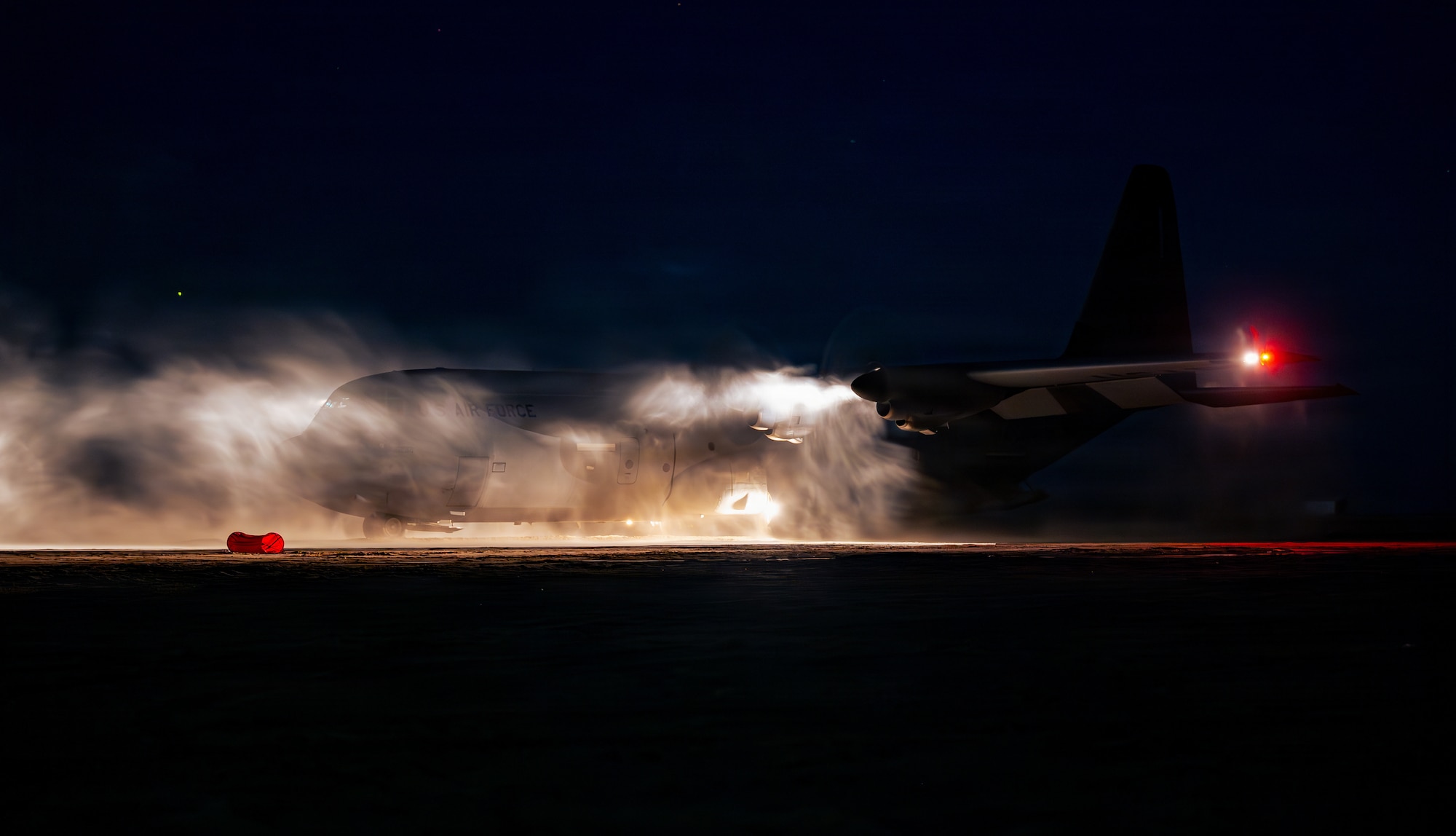 A U.S. Air Force C-130J Super Hercules aircraft assigned to the 37th Airlift Squadron lands on a sand landing zone in Rømø, Denmark, during exercise Northern Viking 26