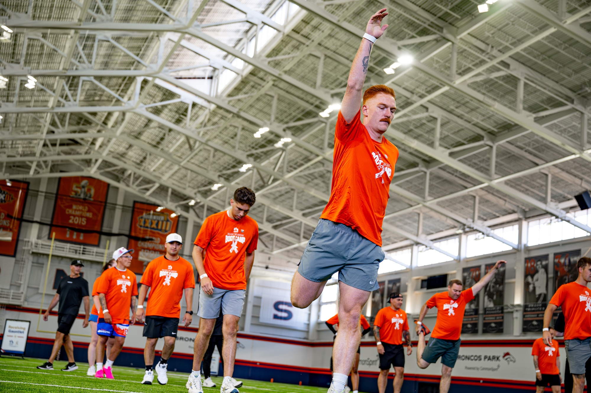 The Peterson and Schriever team warmup before the competition at the USAA Salute to Service Boot Camp